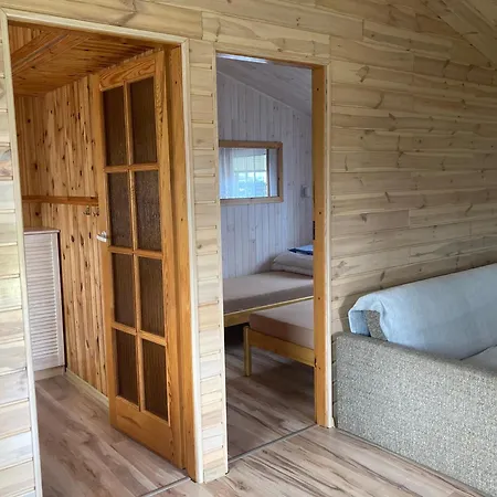 Letniskowe Promyk Деревянный коттедж *